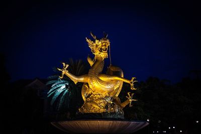 Statue of lit up at night