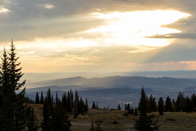 Scenic view of mountains against sky during sunset