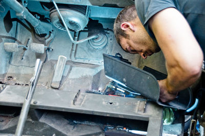 Midsection of man working at construction site