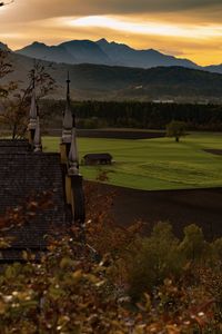 Scenic view of landscape against sky during sunset