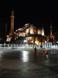 View of illuminated buildings at night