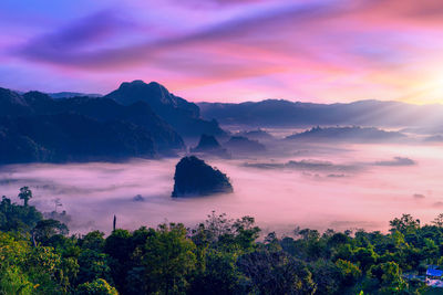 Scenic view of mountains against sky during sunset