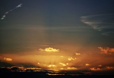 Scenic view of dramatic sky during sunset