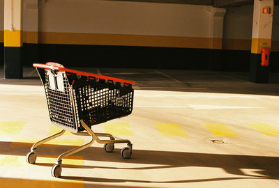 Close-up of shopping cart on table