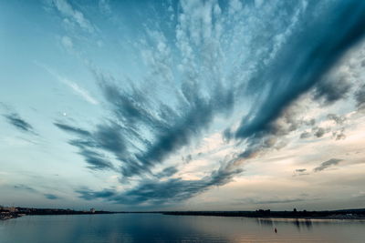 Scenic view of sea against dramatic sky