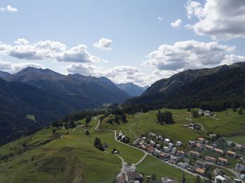 Scenic view of landscape and mountains against sky