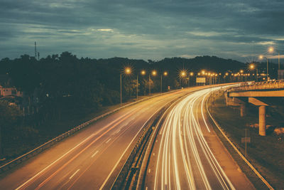 Light trails on road at night