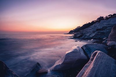 Scenic view of sea against sky during sunset