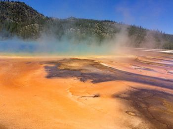 Scenic view of steam emitting for geyser