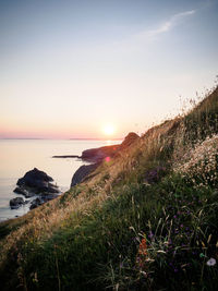 Scenic view of sea against sky during sunset