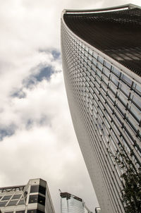Low angle view of modern buildings against sky