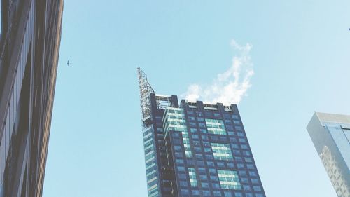 Low angle view of modern building against sky