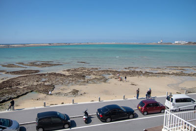 Scenic view of sea against clear blue sky