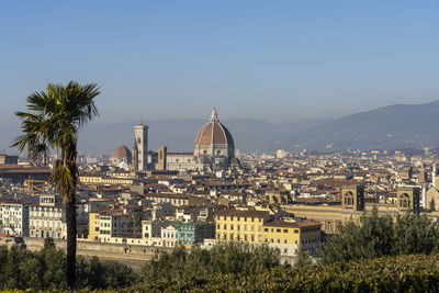 The panorama of the city from piazzale michelangelo on the hill overlooking florence, italy. 