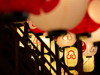 High angle view of illuminated lantern on wall