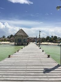 View of bridge against cloudy sky