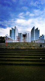 Built structure against cloudy sky