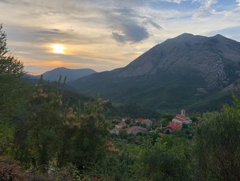 Scenic view of mountains against sky during sunset