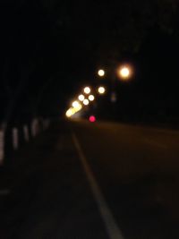 Illuminated street light at night