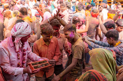 Group of people at market stall