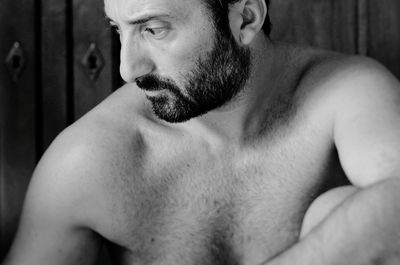 Portrait of young man looking away