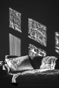 Sunlight falling on bed in house