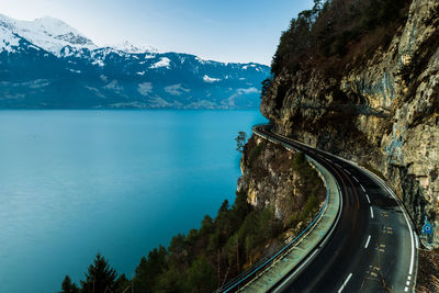 Mountain road by sea during winter