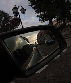 Reflection of street light on side-view mirror