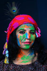 A young girl celebrating the festival of colours, holi.