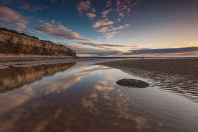 Scenic view of sea against sky during sunset