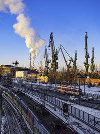 Train on railroad tracks against sky