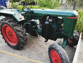 Close-up of tractor on street