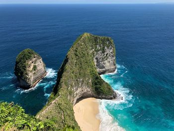 High angle view of rocks in sea