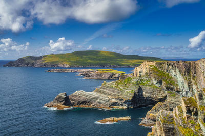 Beautiful kerry cliffs illuminated by sunlight and a view on bray head