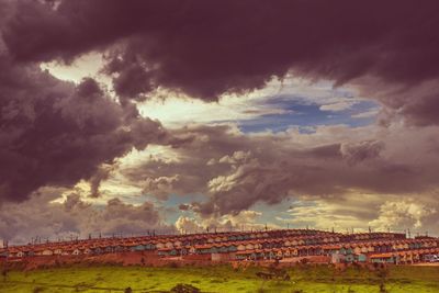 Scenic view of storm clouds over dramatic sky