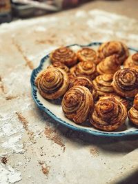 High angle view of cookies in plate on table