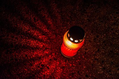 High angle view of illuminated lamp on table