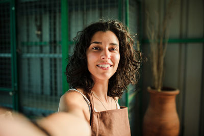 Portrait of smiling young woman