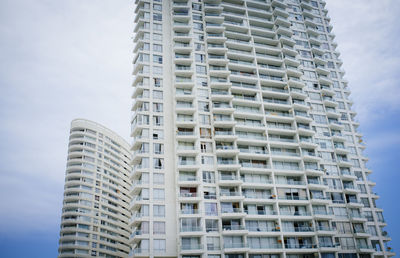 Low angle view of modern building against sky