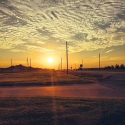 Scenic view of landscape against cloudy sky