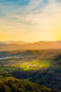 Scenic view of landscape against sky during sunset