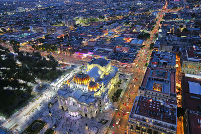 High angle view of city buildings at night