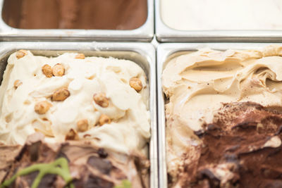Close-up of ice cream in container at parlor
