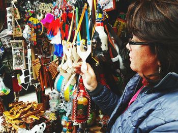 Side view of man in shop