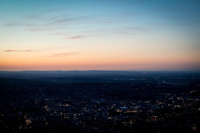 Scenic view of landscape against sky at sunset