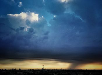 Clouds over city at dusk