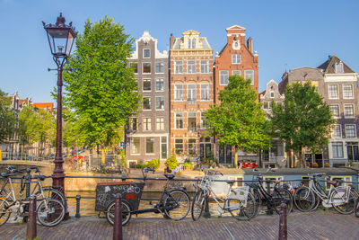 View of three canal houses on herengracht canal in amsterdam 