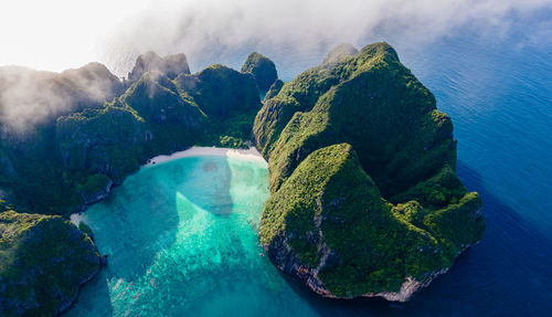 High angle view of rocks in sea