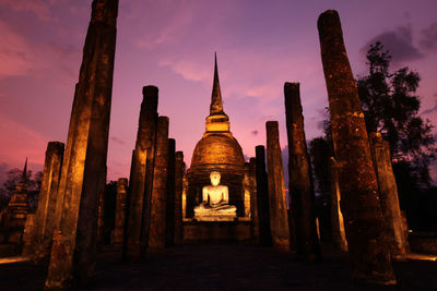 Historic building against sky at dusk