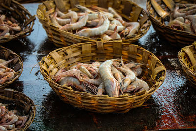 Close-up of seafood in baskets for sale